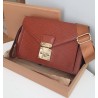 Louis Vuitton Epi Sellier Dragonne Clutch Epi Leder Cognac M52618