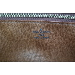 Louis Vuitton Epi Sellier Dragonne Clutch Epi Leder Cognac M52618