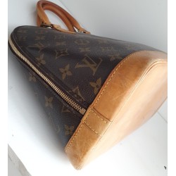 Louis Vuitton Alma Monogram Canvas.
