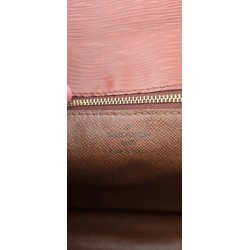 Louis Vuitton Epi Sellier Dragonne Clutch Epi Leder Cognac M52618