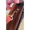 Louis Vuitton Epi Sellier Dragonne Clutch Epi Leder Cognac M52618